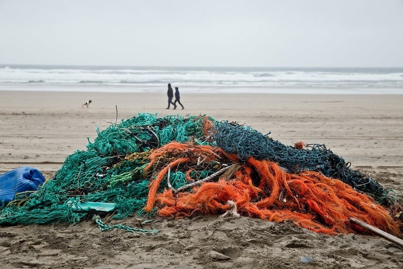 Pile of ghost gear on Perranporth beach, UK